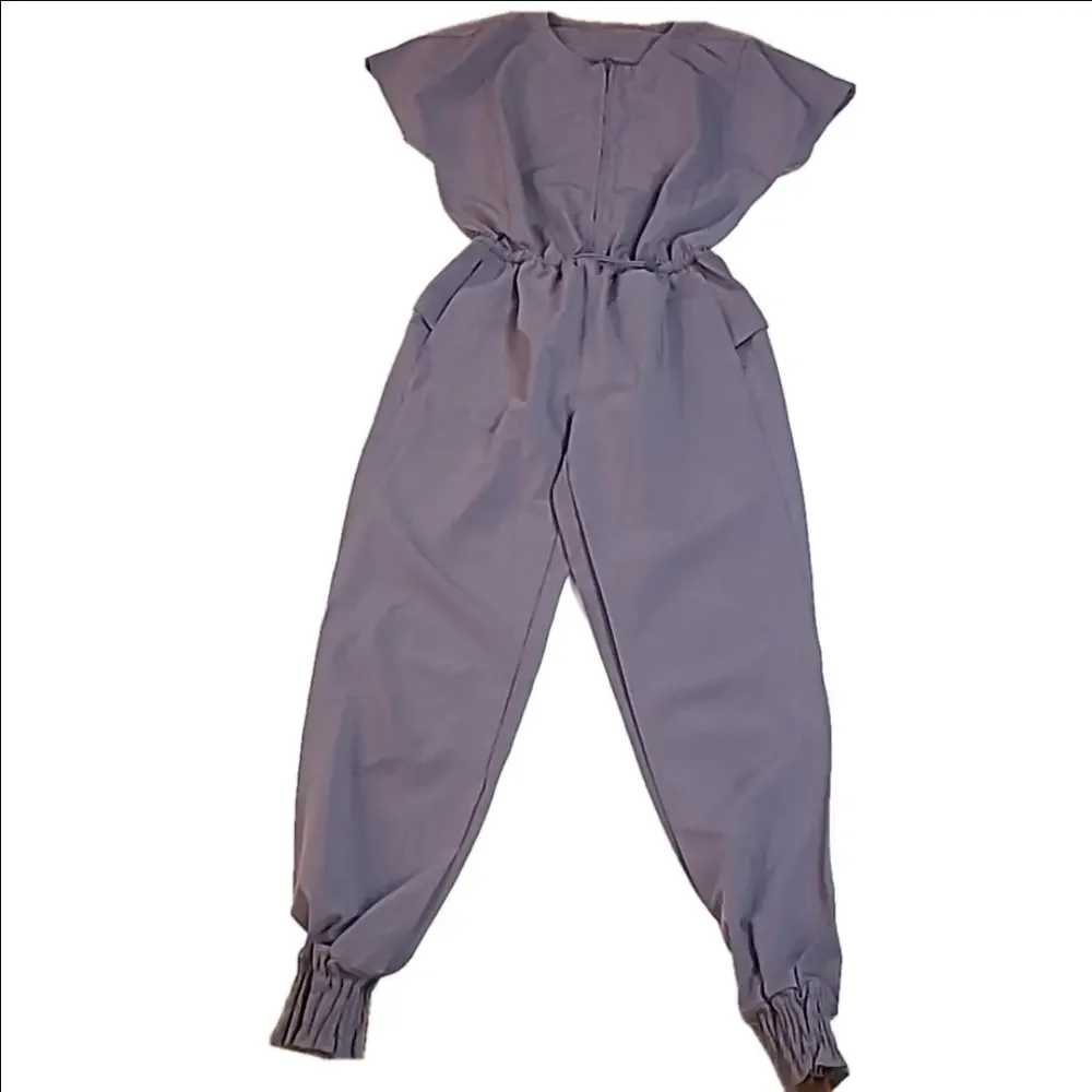 #379 Lululemon Stretch Travel Woven Jumpsuit in Dusky Lavender Size 0 o230